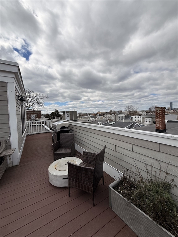161 Tudor Street, Unit 3 Boston, MA 02127 - Photo 27 of 27 a view of a terrace with furniture