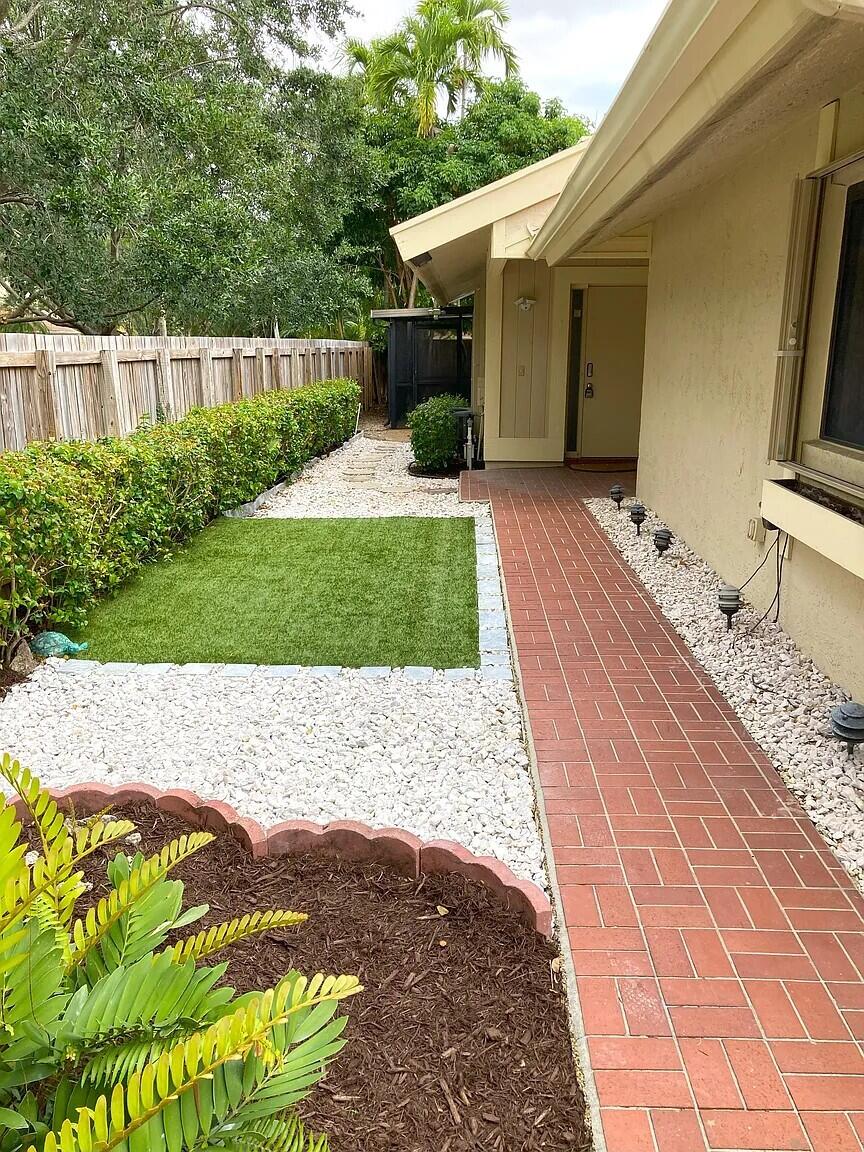 7755 Kenway Place East Boca Raton, FL 33433 - Photo 21 of 25 Garden View