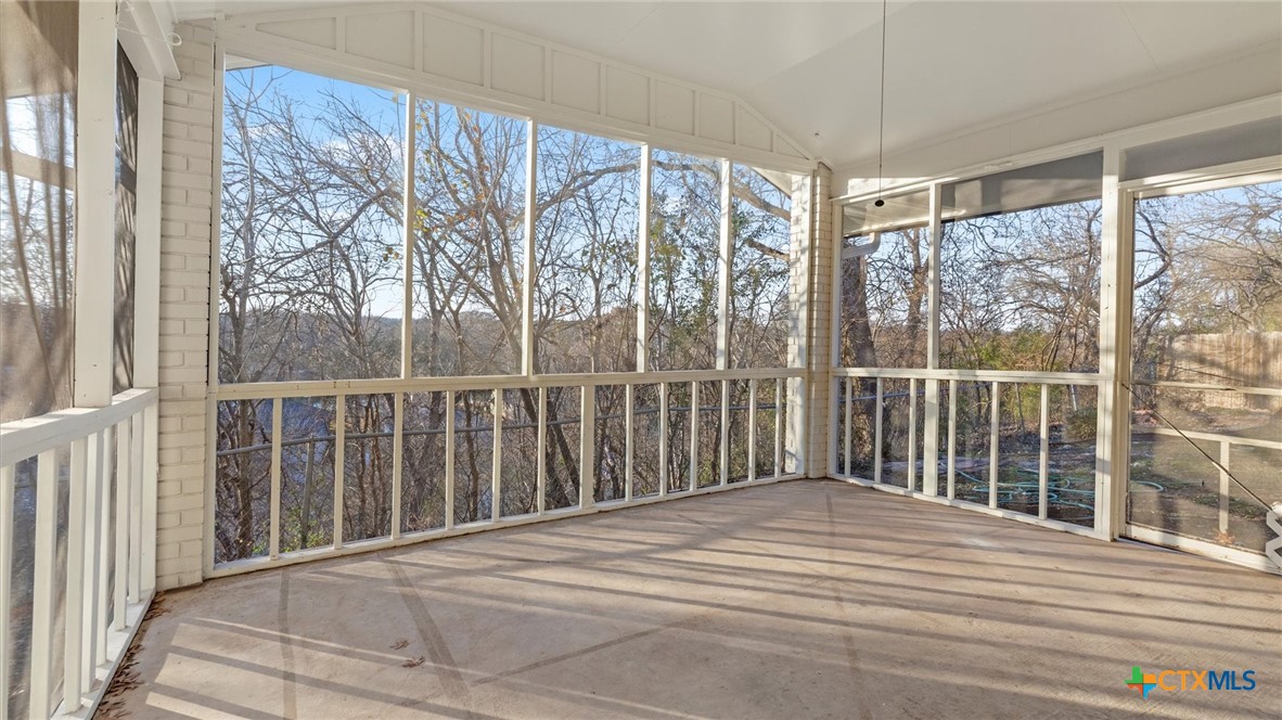 300 Ridge Crest Drive Seguin, TX 78155 - Photo 19 of 33 a bedroom with a bed and a large window