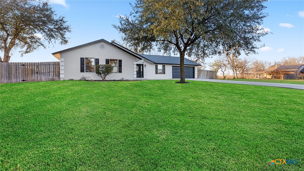 300 Ridge Crest Drive Seguin, TX 78155 - Photo 2 of 33 a house view with a garden space