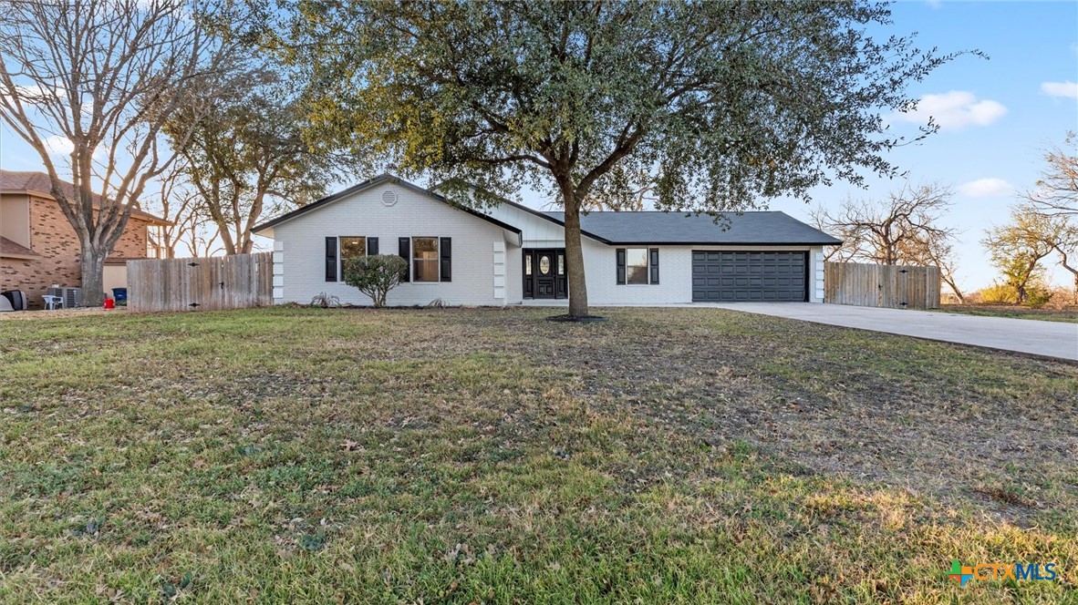 300 Ridge Crest Drive Seguin, TX 78155 - Photo 23 of 33 front view of a house with a yard