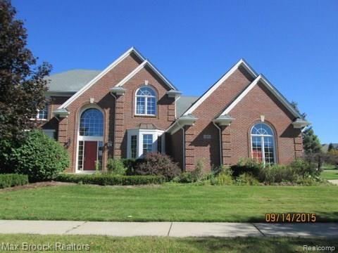 404 Springview Drive Rochester, MI 48307 - Photo 1 of 19 BRICK COLONIAL ACROSS FROM HOA CLUB HOUSE & POOL