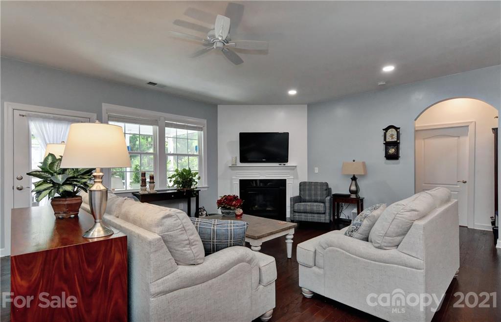4978 Samoa Ridge Drive Lancaster, SC 29720 - Photo 17 of 38 a living room with furniture fireplace and a flat screen tv