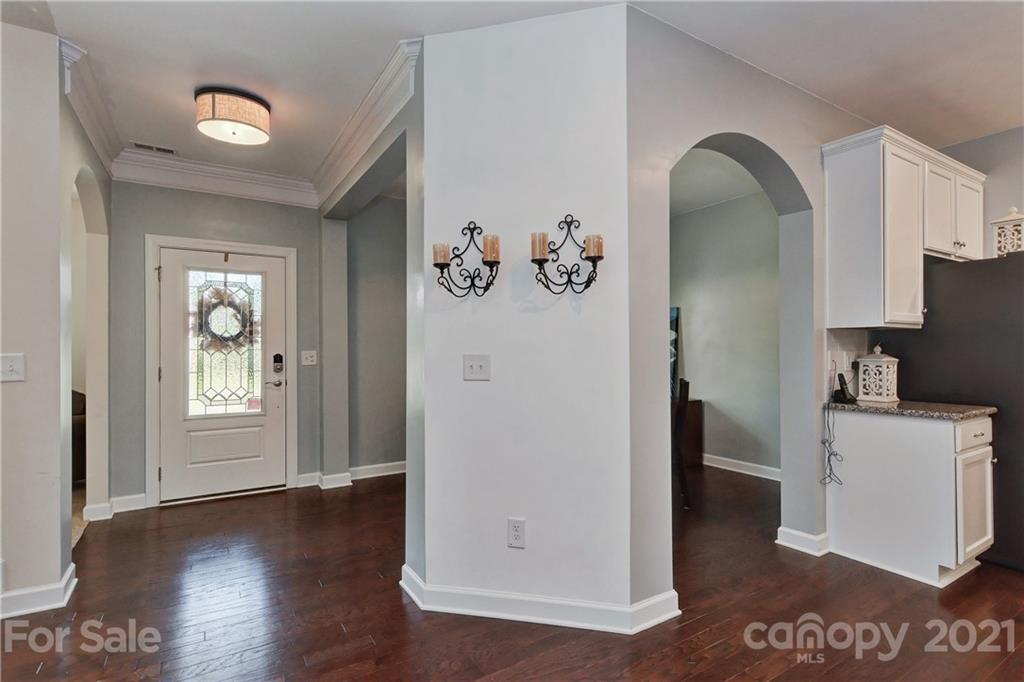 4978 Samoa Ridge Drive Lancaster, SC 29720 - Photo 3 of 38 a view of a kitchen with fridge and wooden floor