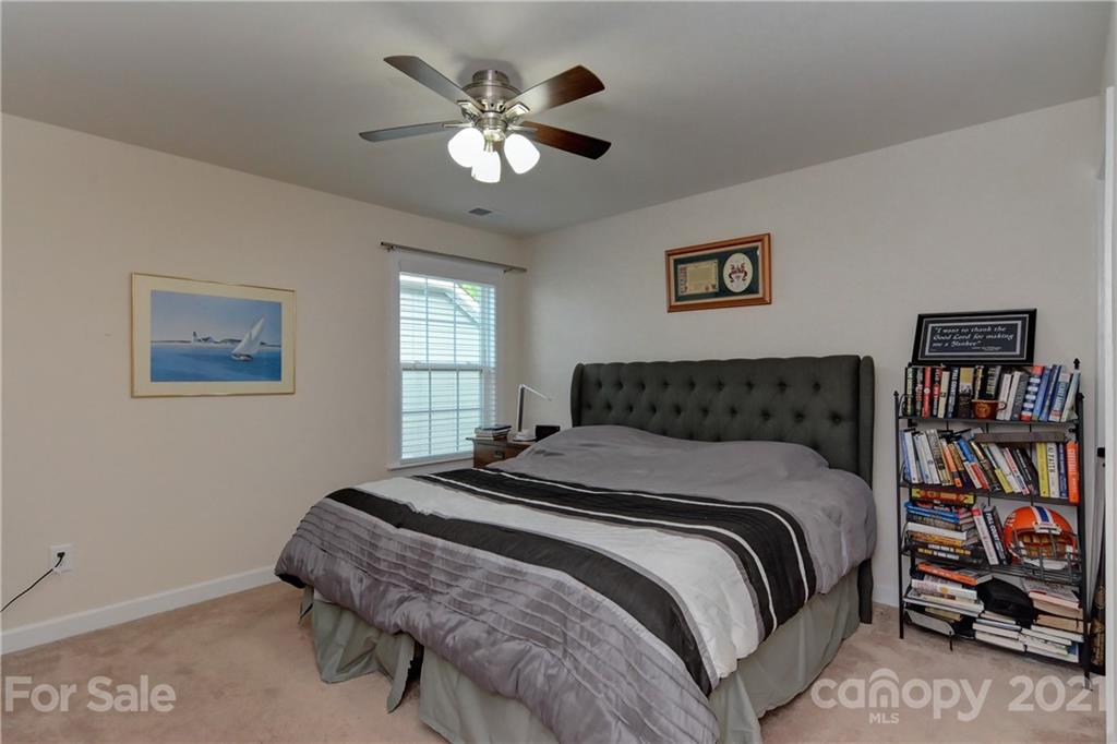 4978 Samoa Ridge Drive Lancaster, SC 29720 - Photo 27 of 38 a bedroom with a bed painting on the wall and a window