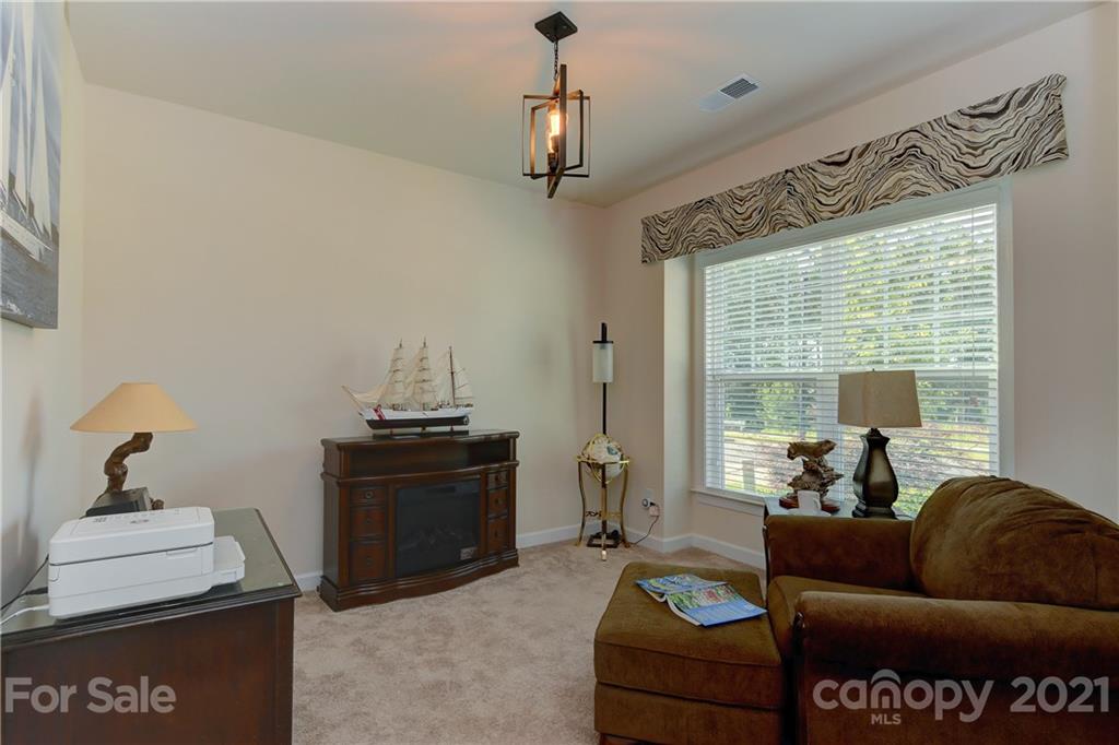 4978 Samoa Ridge Drive Lancaster, SC 29720 - Photo 5 of 38 a living room with furniture and a window