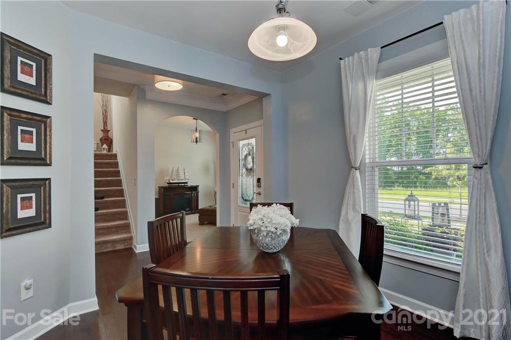 4978 Samoa Ridge Drive Lancaster, SC 29720 - Photo 6 of 38 a view of a dining room with furniture window and wooden floor