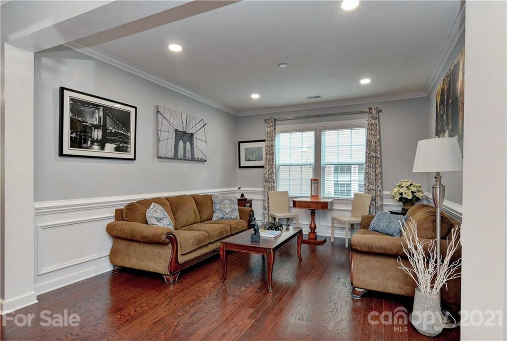 4978 Samoa Ridge Drive Lancaster, SC 29720 - Photo 10 of 38 a living room with furniture and a wooden floor