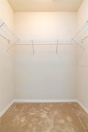 a view of a room with racks on the wall