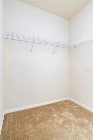 a view of a room with racks on the wall