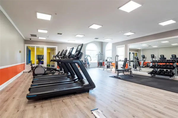 a very nice looking living room with furniture and a wooden floor