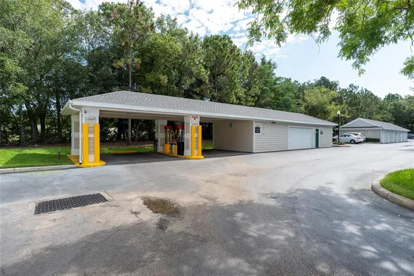 a city street lined with buildings and trees