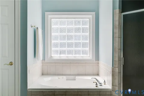 a view of a bathtub in a bathroom