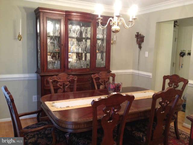 730 Monarch Ridge Road Frederick, MD 21703 - Photo 12 of 30 a view of a dining room with furniture and window