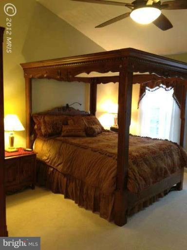 730 Monarch Ridge Road Frederick, MD 21703 - Photo 15 of 30 a bedroom with a bed and window