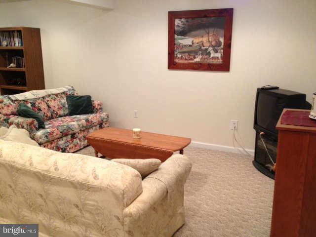 730 Monarch Ridge Road Frederick, MD 21703 - Photo 20 of 30 a bedroom with a bed and furniture