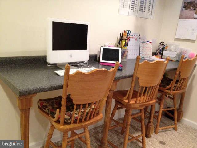 730 Monarch Ridge Road Frederick, MD 21703 - Photo 21 of 30 a workspace with furniture and wooden floor