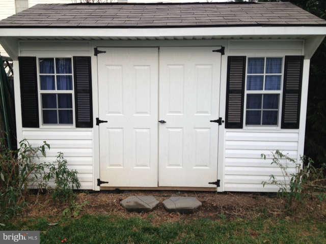 730 Monarch Ridge Road Frederick, MD 21703 - Photo 29 of 30 a front view of a house with a yard