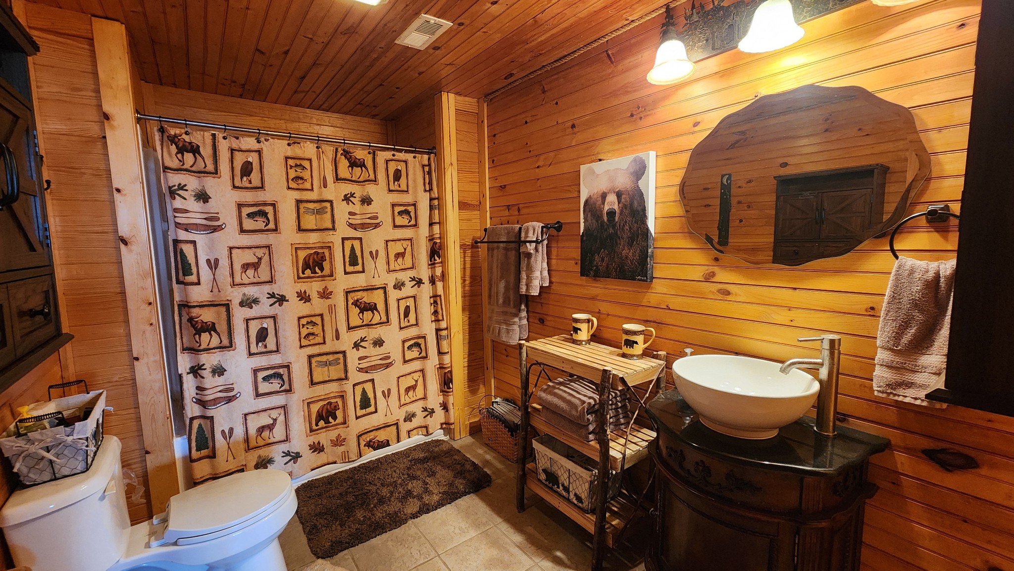 5615 Eastport Road Alpine, TN 38543 - Photo 20 of 83 a bathroom with a sink toilet and shower