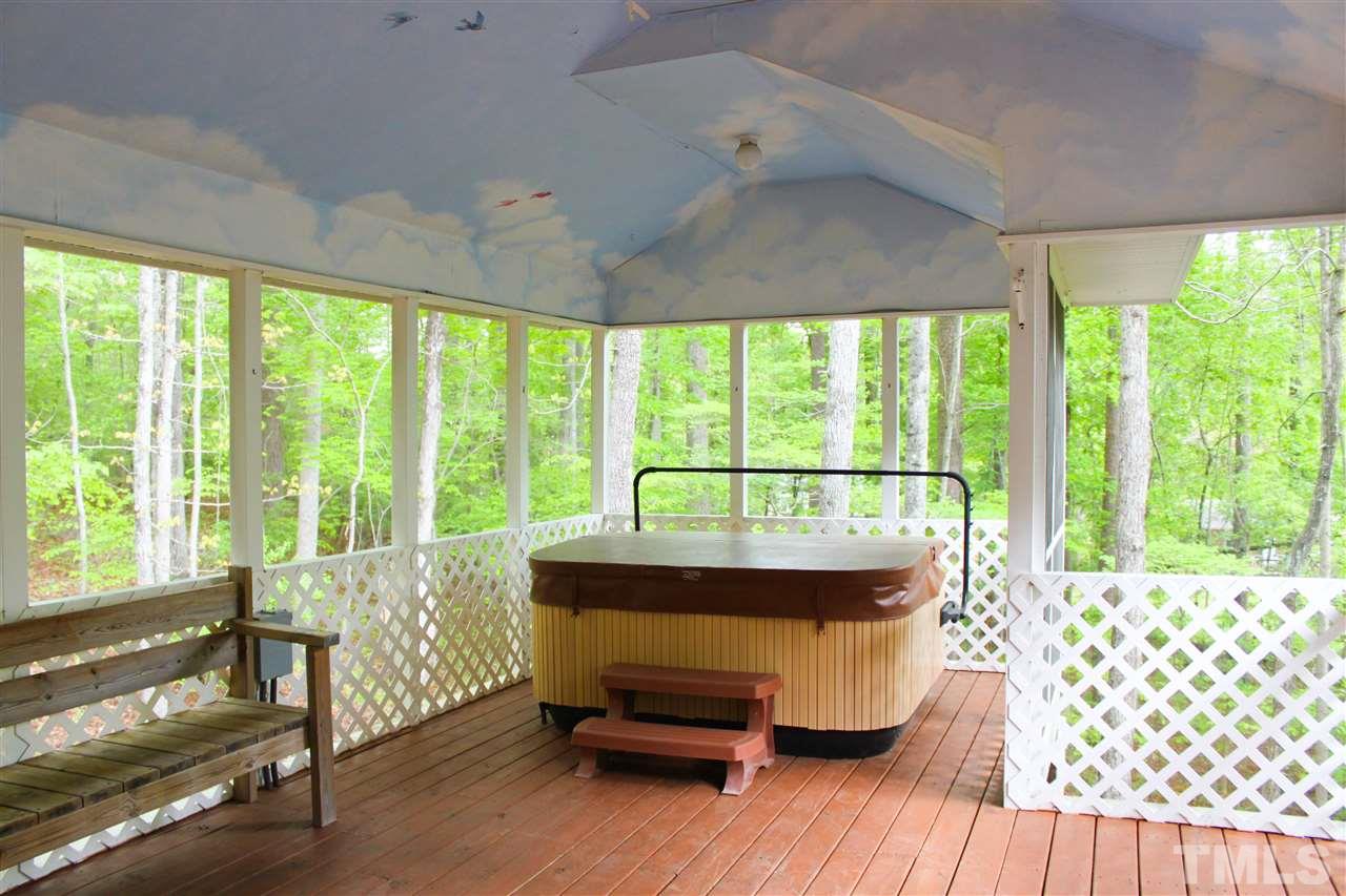 505 Booth Road Chapel Hill, NC 27516 - Photo 18 of 25 a room with wooden floor and a window