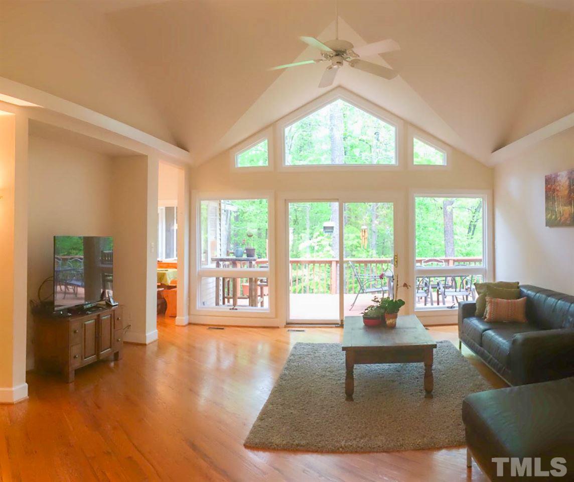505 Booth Road Chapel Hill, NC 27516 - Photo 6 of 25 a living room with furniture and a large window