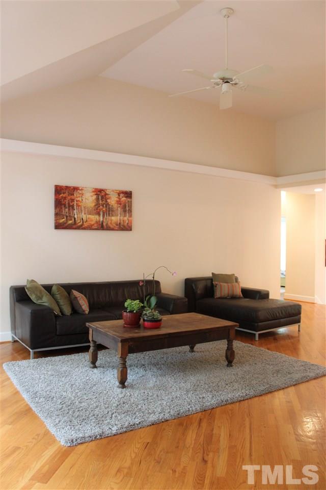 505 Booth Road Chapel Hill, NC 27516 - Photo 7 of 25 a living room with furniture and a rug