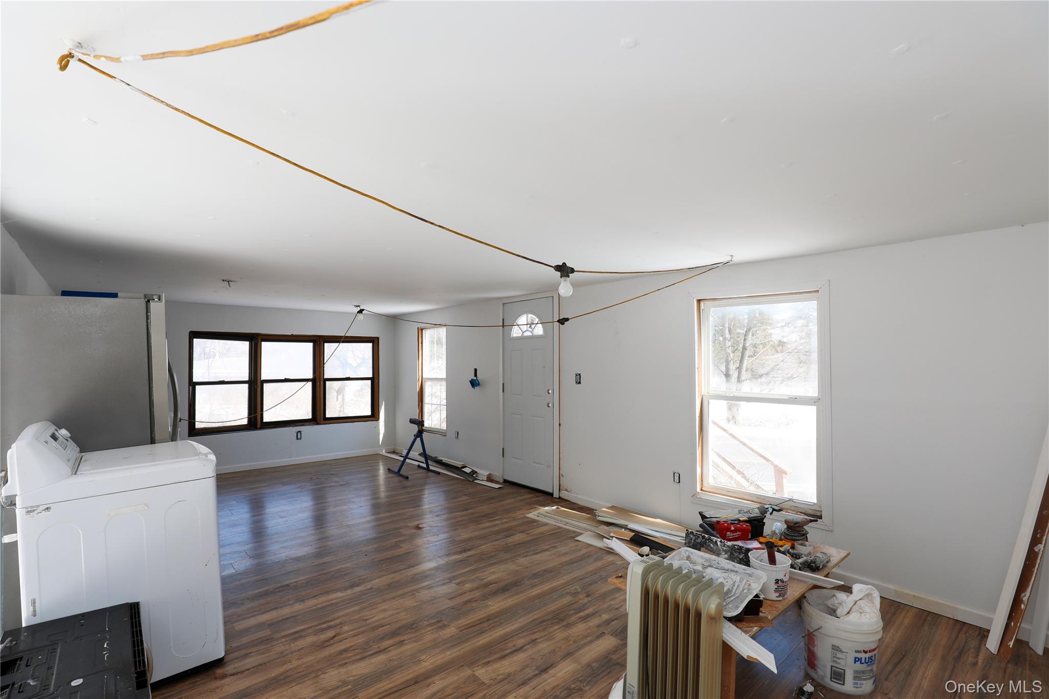654 Broadway, Unit 9W Esopus, NY 12487 - Photo 21 of 26 a room with furniture and a window