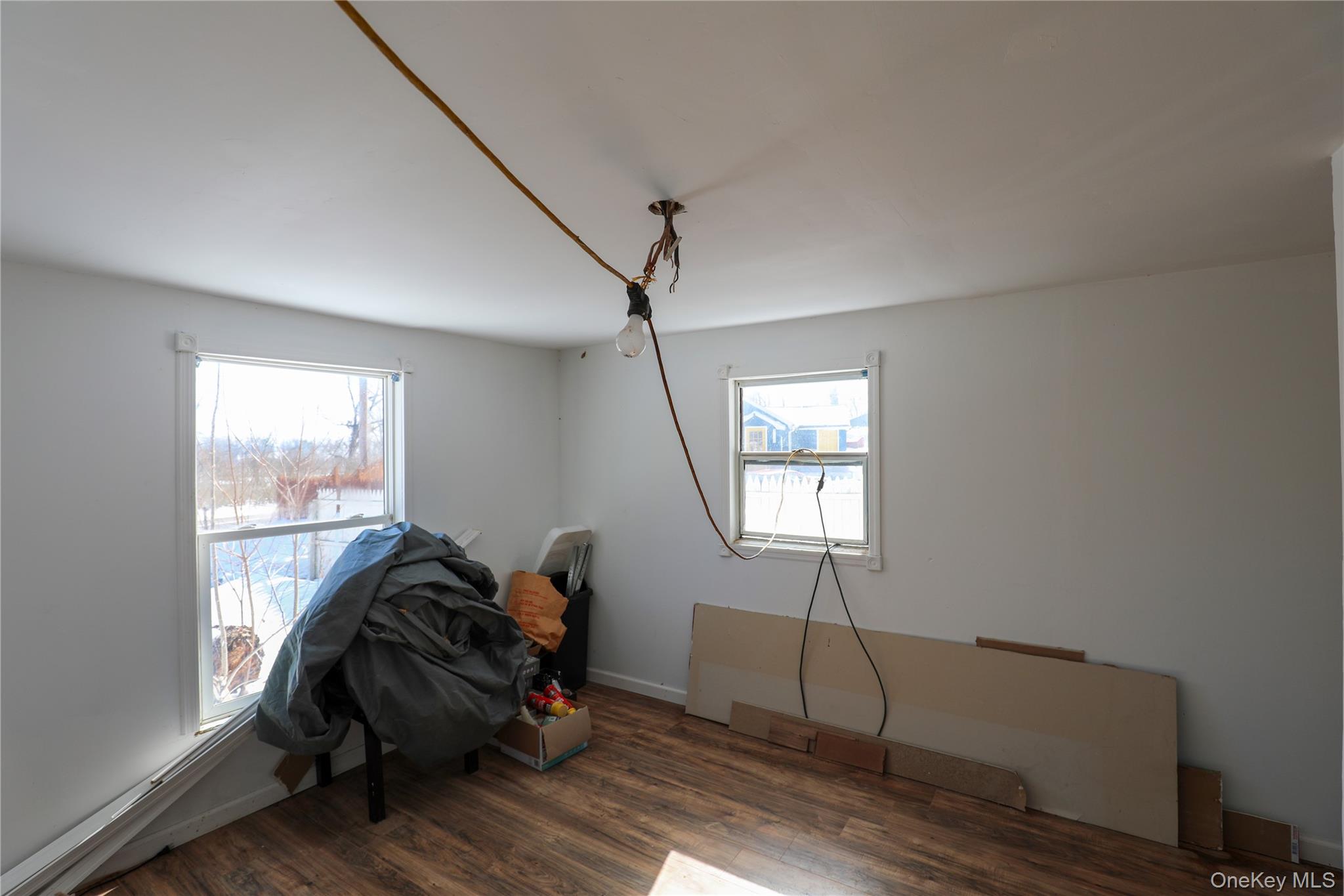 654 Broadway, Unit 9W Esopus, NY 12487 - Photo 24 of 26 a living room with furniture and a window