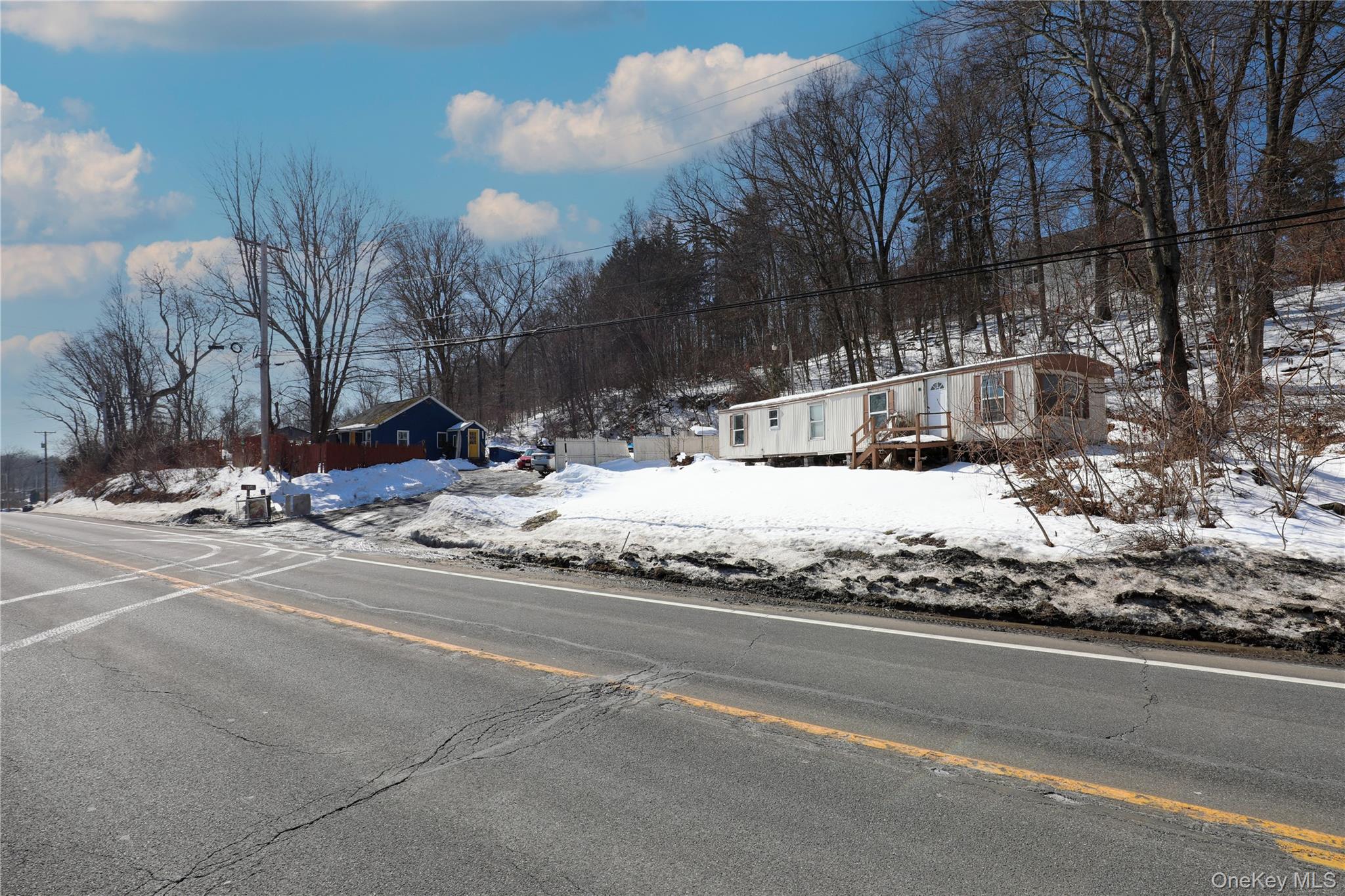 654 Broadway, Unit 9W Esopus, NY 12487 - Photo 26 of 26 a view of street with a house