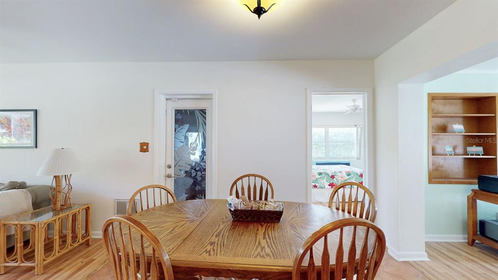 1618 Tuscola Road Clearwater, FL 33756 - Photo 14 of 64 a view of a dining room with furniture