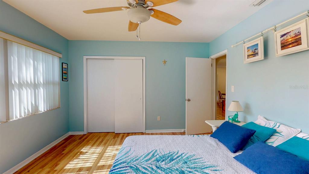 1618 Tuscola Road Clearwater, FL 33756 - Photo 35 of 64 a bedroom with a bed and a window