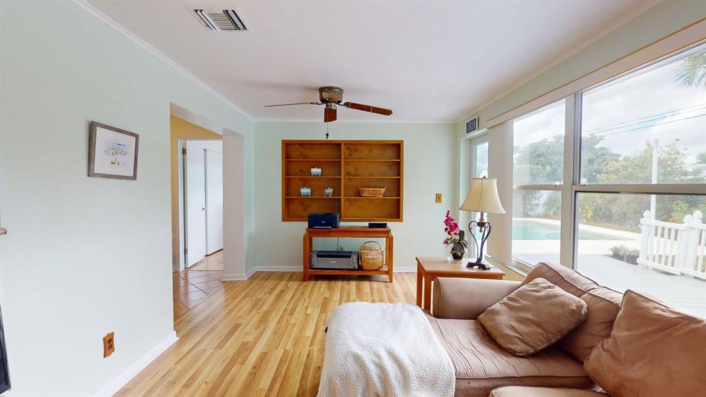 1618 Tuscola Road Clearwater, FL 33756 - Photo 49 of 64 a living room with furniture and a window