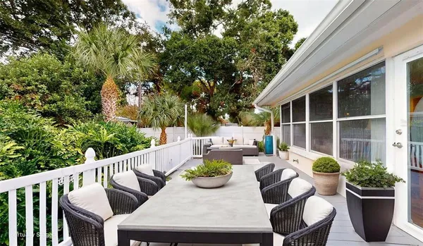 a view of a living room and dining room