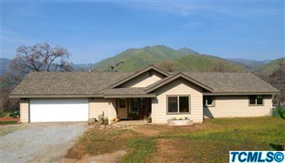 40131 Pierce Drive Three Rivers, CA 93271 - Photo 1 of 25 a house with trees in the background