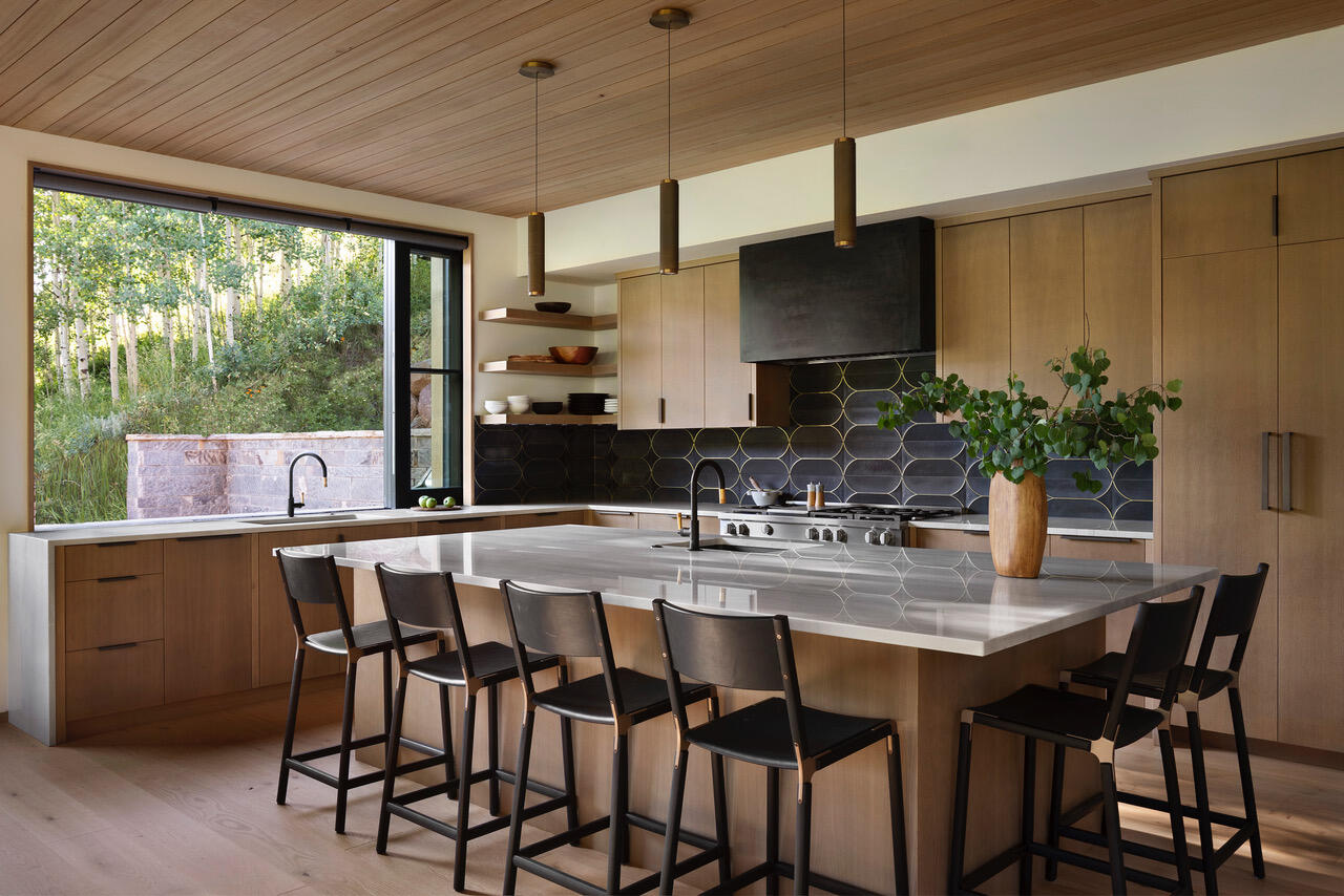 653 East Pandora Avenue Telluride, CO 81435 - Photo 17 of 35 a kitchen with a table chairs sink and cabinets