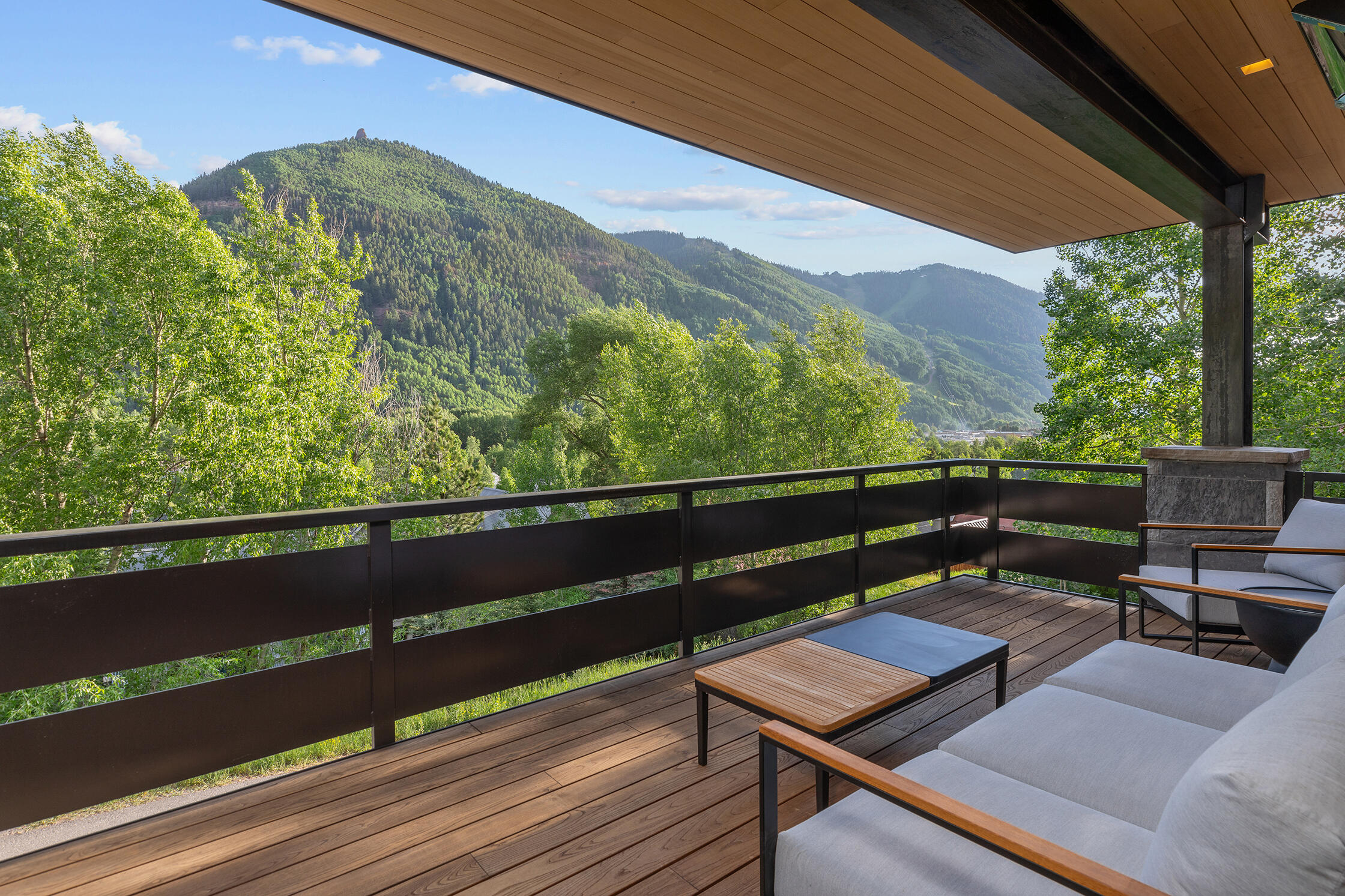 653 East Pandora Avenue Telluride, CO 81435 - Photo 31 of 35 a view of a balcony with wooden floor and outdoor seating