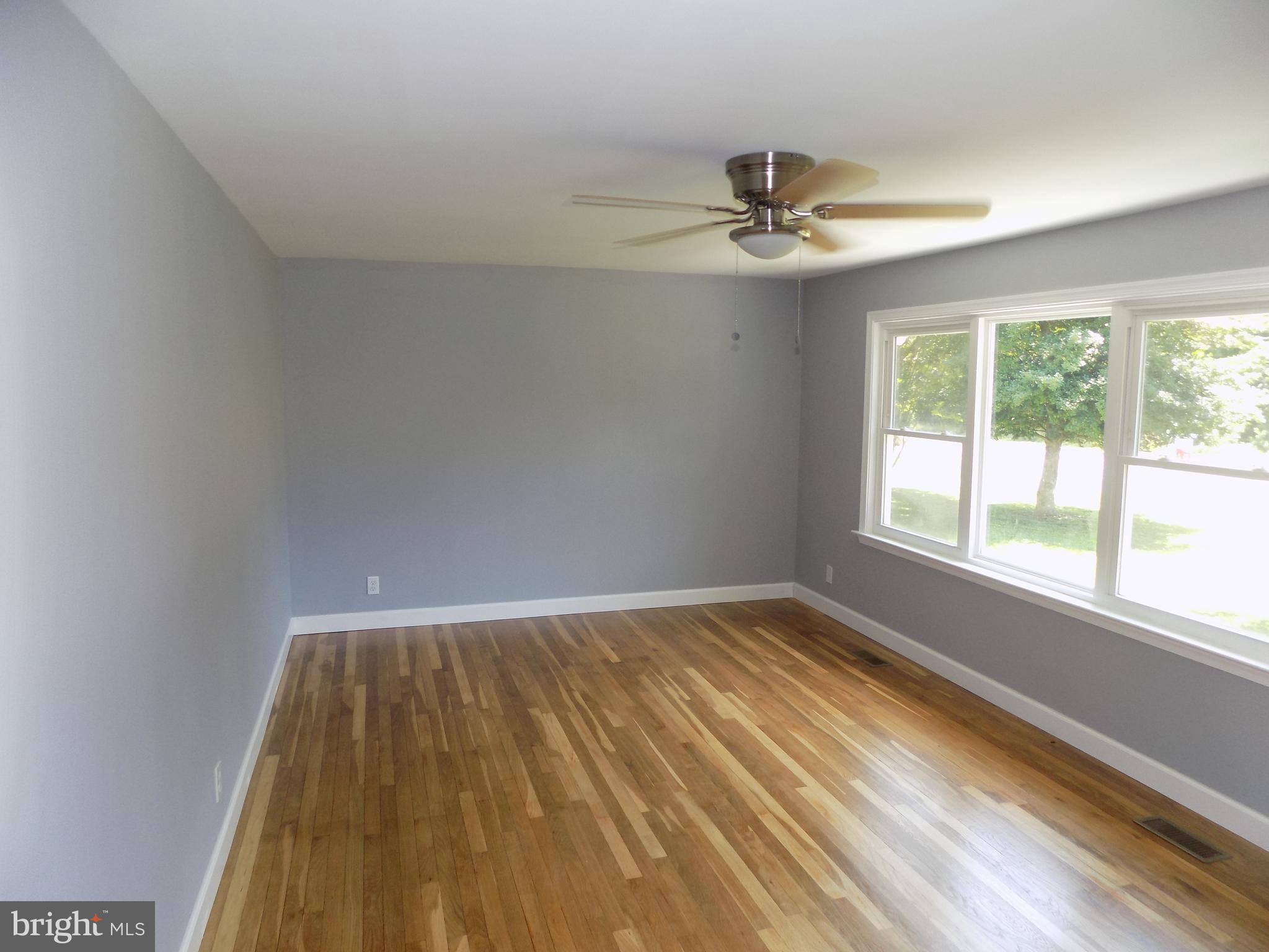 620 Romancoke Road Stevensville, MD 21666 - Photo 19 of 47 Gleaming hardwoods in living room.