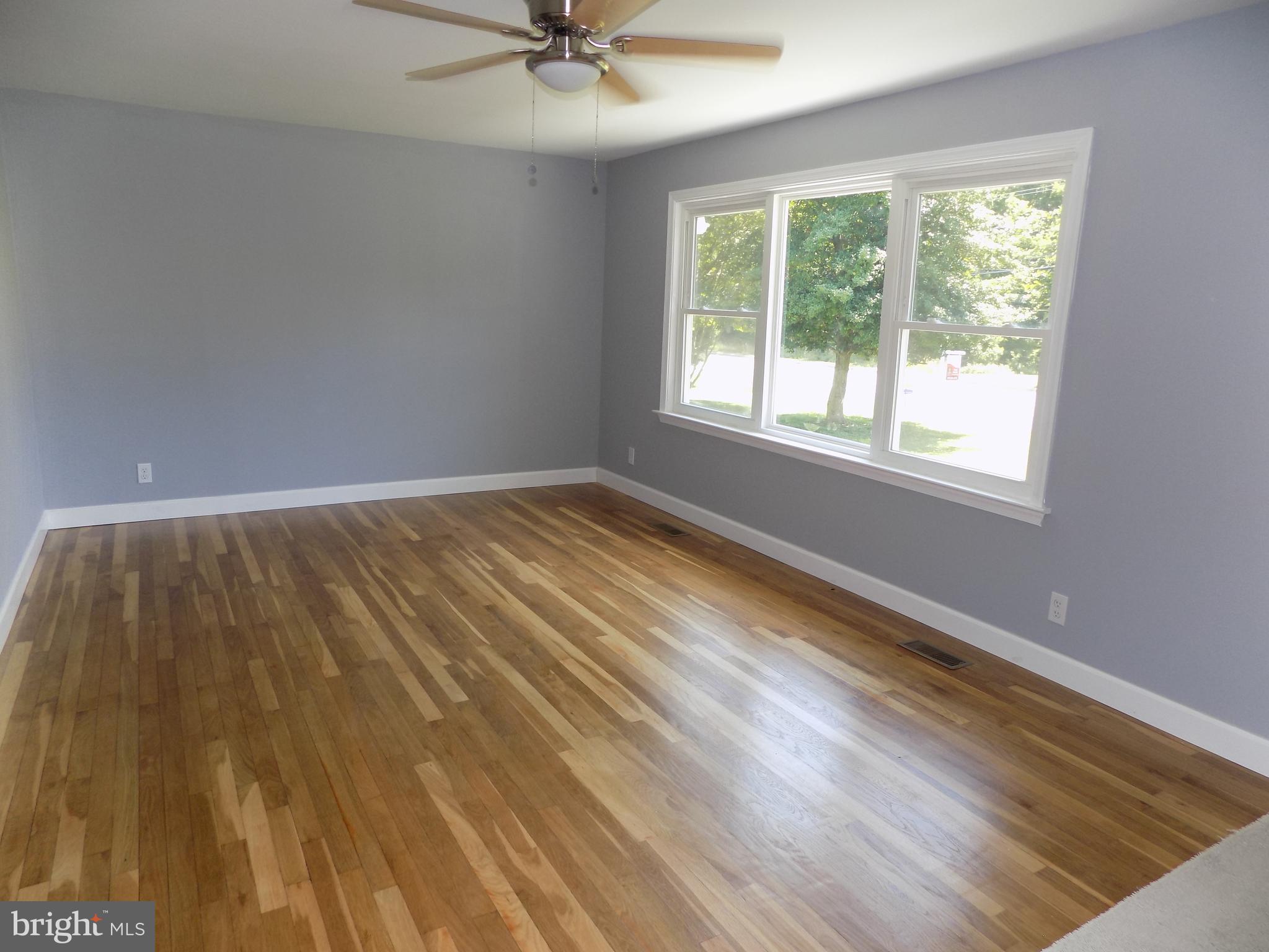 620 Romancoke Road Stevensville, MD 21666 - Photo 20 of 47 Gleaming hardwoods in living room.