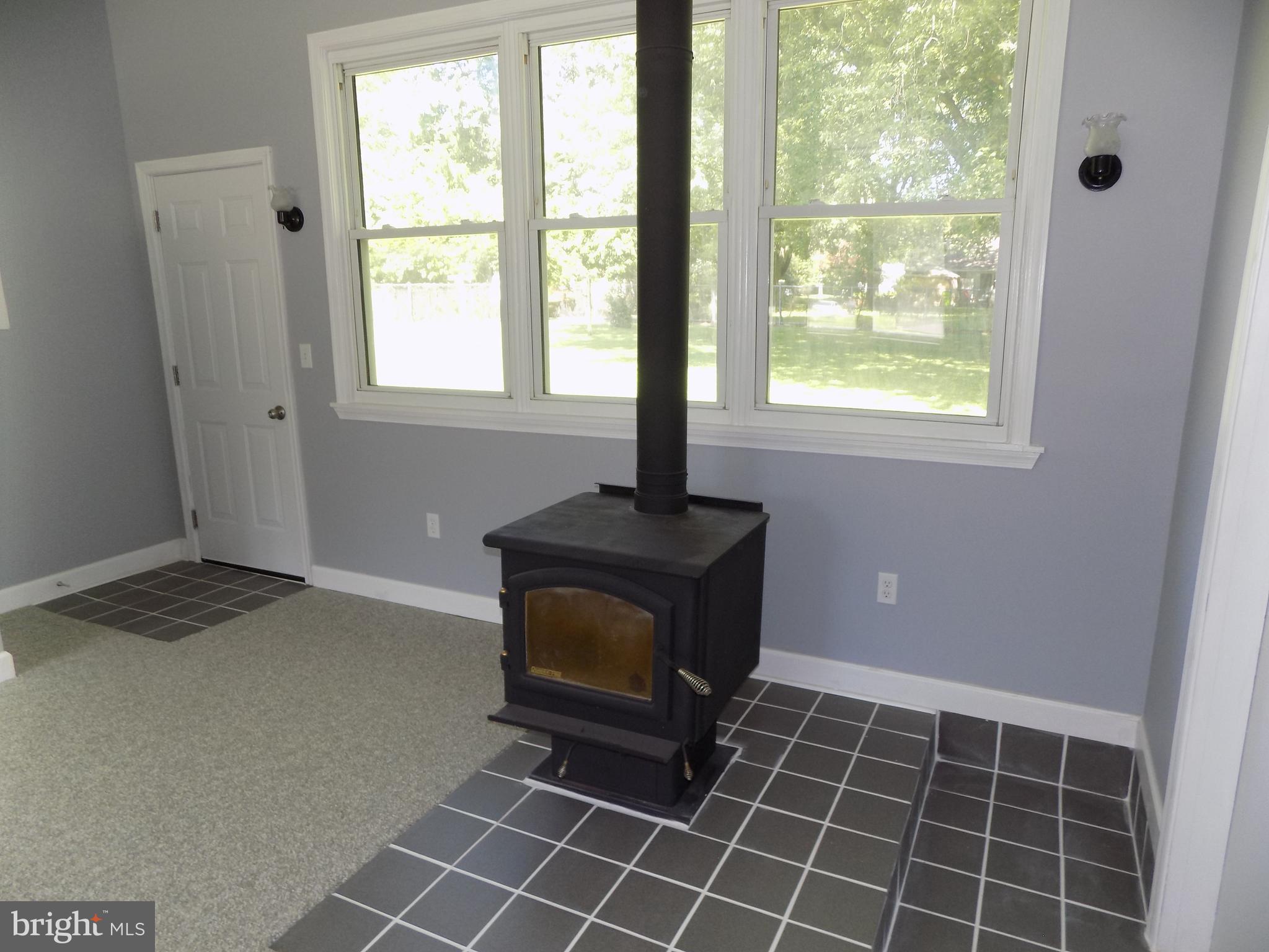 620 Romancoke Road Stevensville, MD 21666 - Photo 26 of 47 Wood stove in bonus room!
