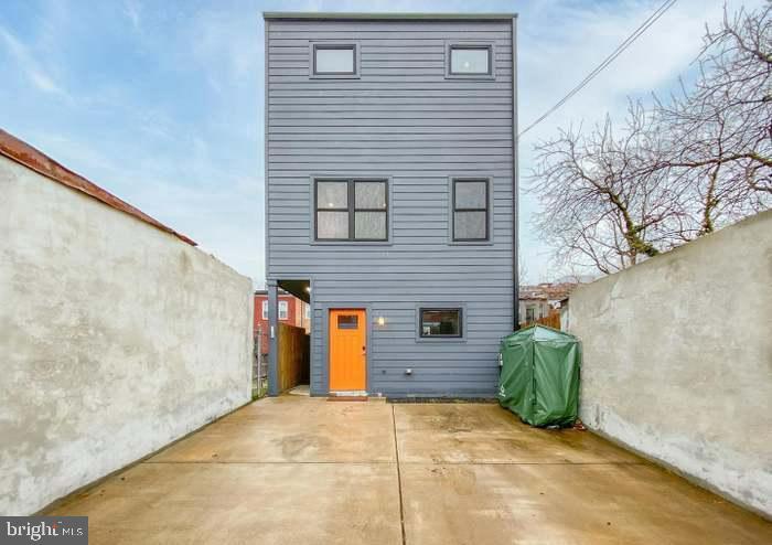 628 I Street Northeast, Unit 3 Washington, DC 20002 - Photo 31 of 32 a view of a house with a garage