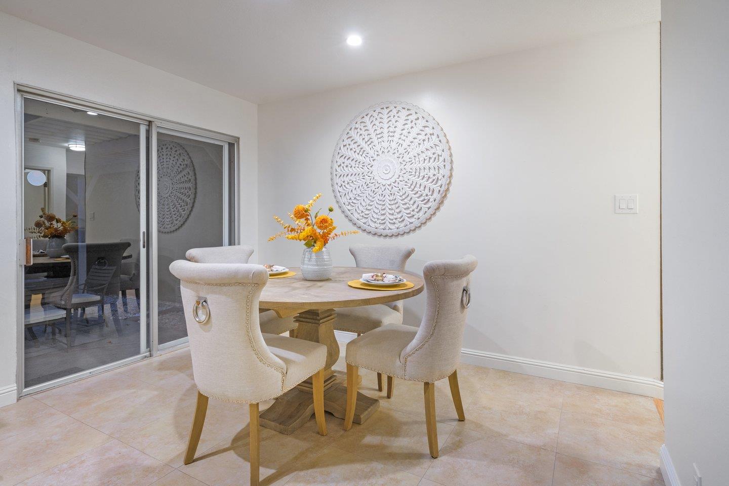 7457 Rollingdell Drive Cupertino, CA 95014 - Photo 15 of 33 a table and chairs in a room