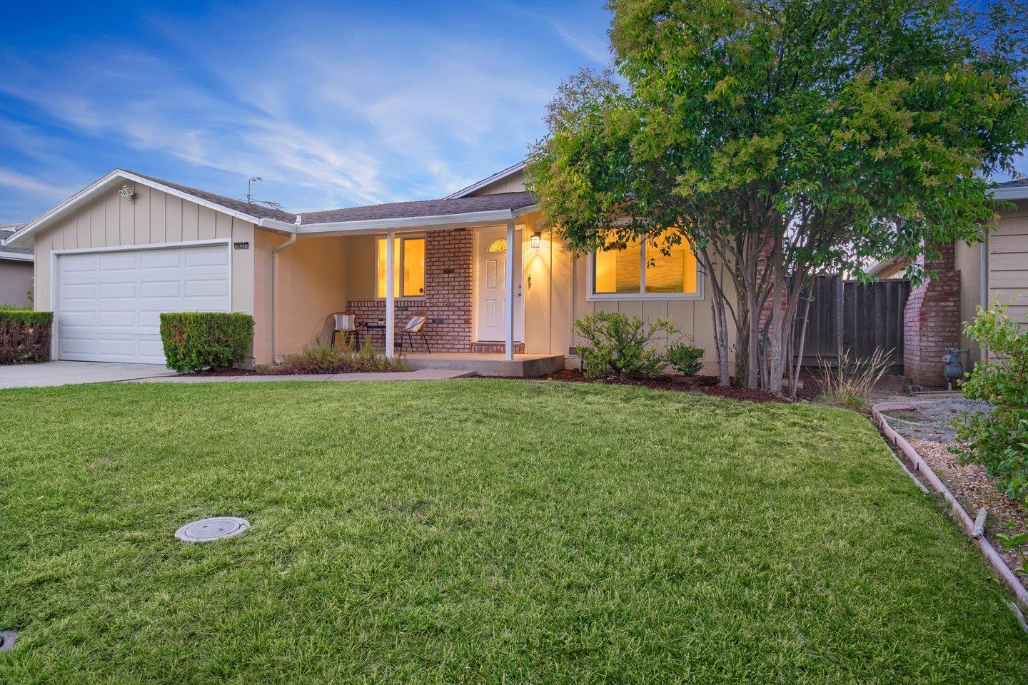 7457 Rollingdell Drive Cupertino, CA 95014 - Photo 3 of 33 a front view of house with yard and outdoor seating