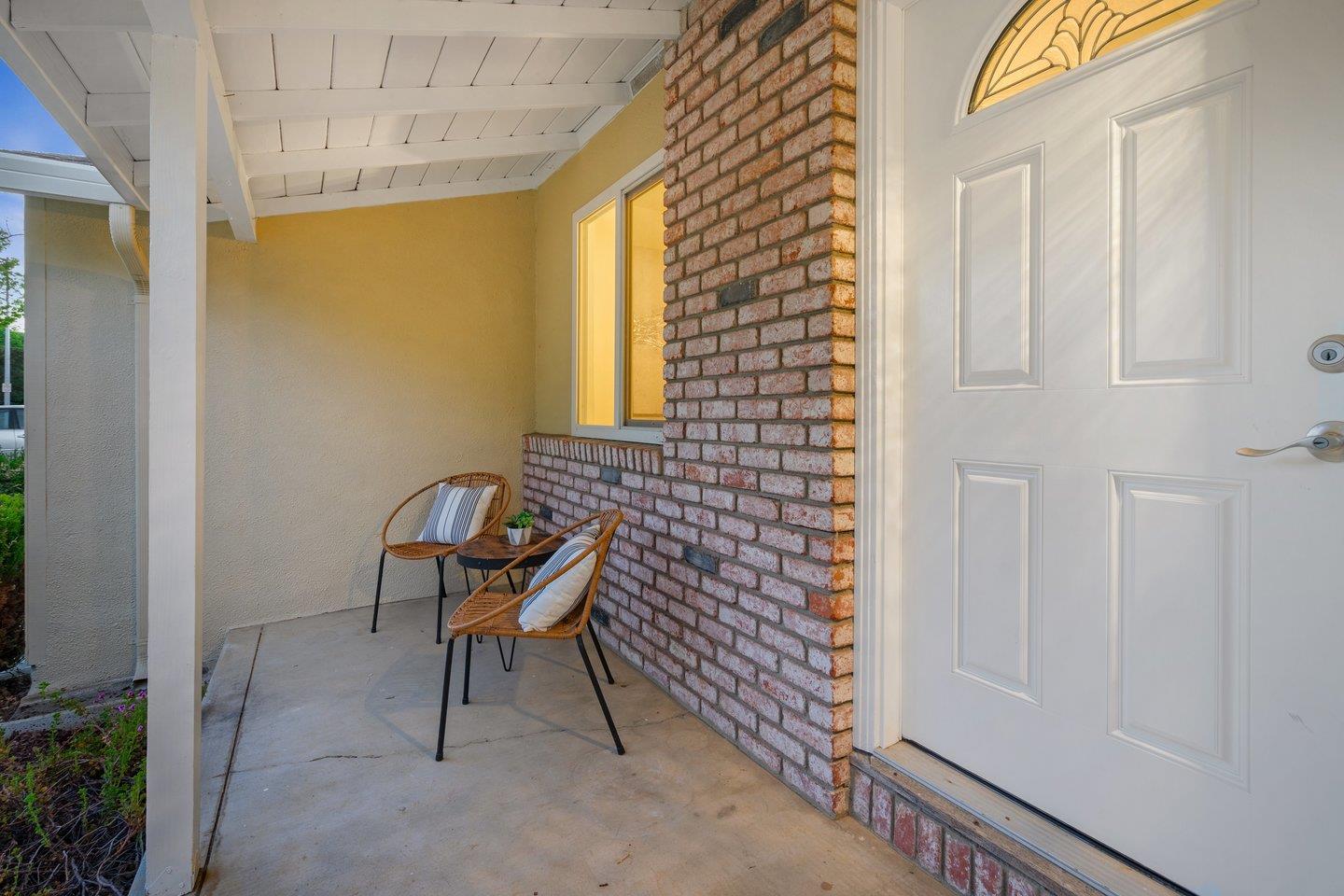 7457 Rollingdell Drive Cupertino, CA 95014 - Photo 7 of 33 a view of a door and chair in the room