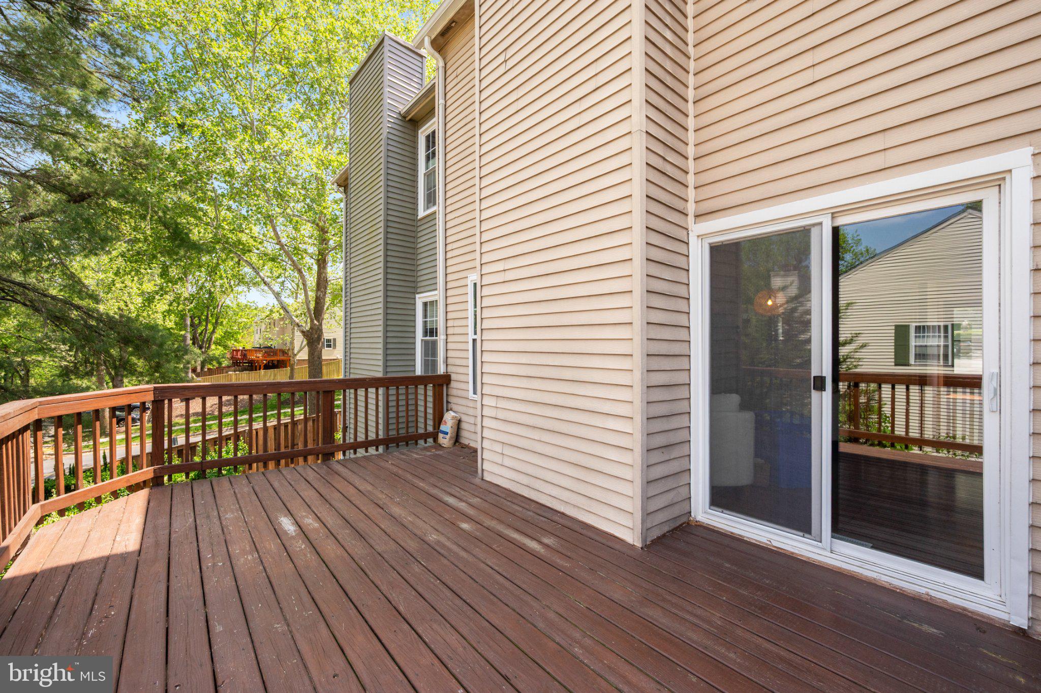 10364 Castlehedge Terrace Silver Spring, MD 20902 - Photo 13 of 31 Sunny deck with lush greenery view.