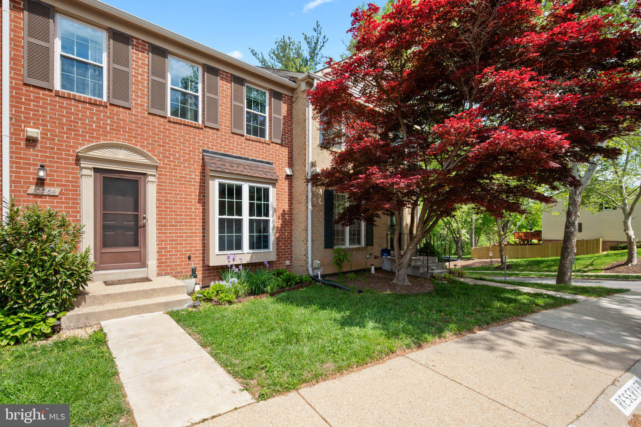 10364 Castlehedge Terrace Silver Spring, MD 20902 - Photo 2 of 31 Charming brick home with vibrant foliage.
