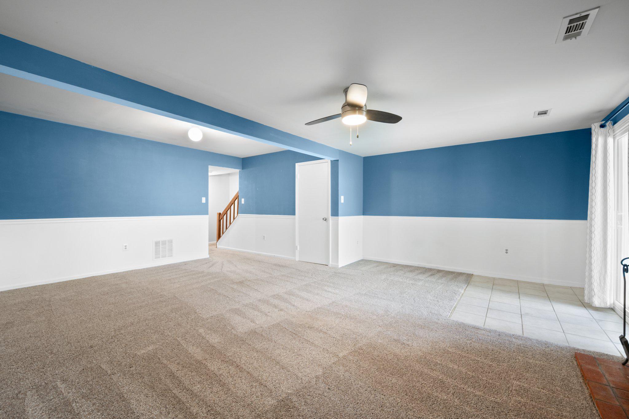 10364 Castlehedge Terrace Silver Spring, MD 20902 - Photo 25 of 31 Roomy basement w/ natural light and sliding doors