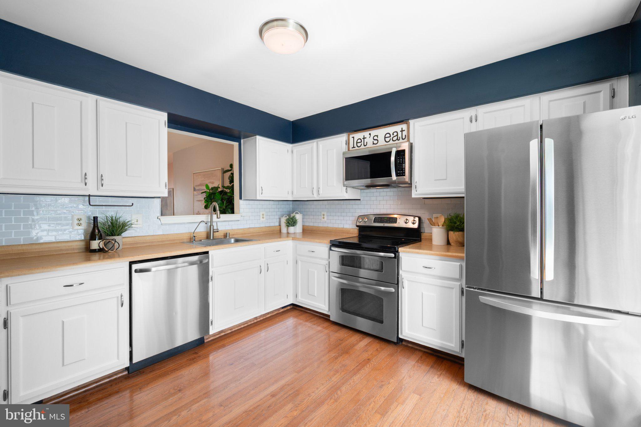 10364 Castlehedge Terrace Silver Spring, MD 20902 - Photo 5 of 31 Modern kitchen with sleek finishes.