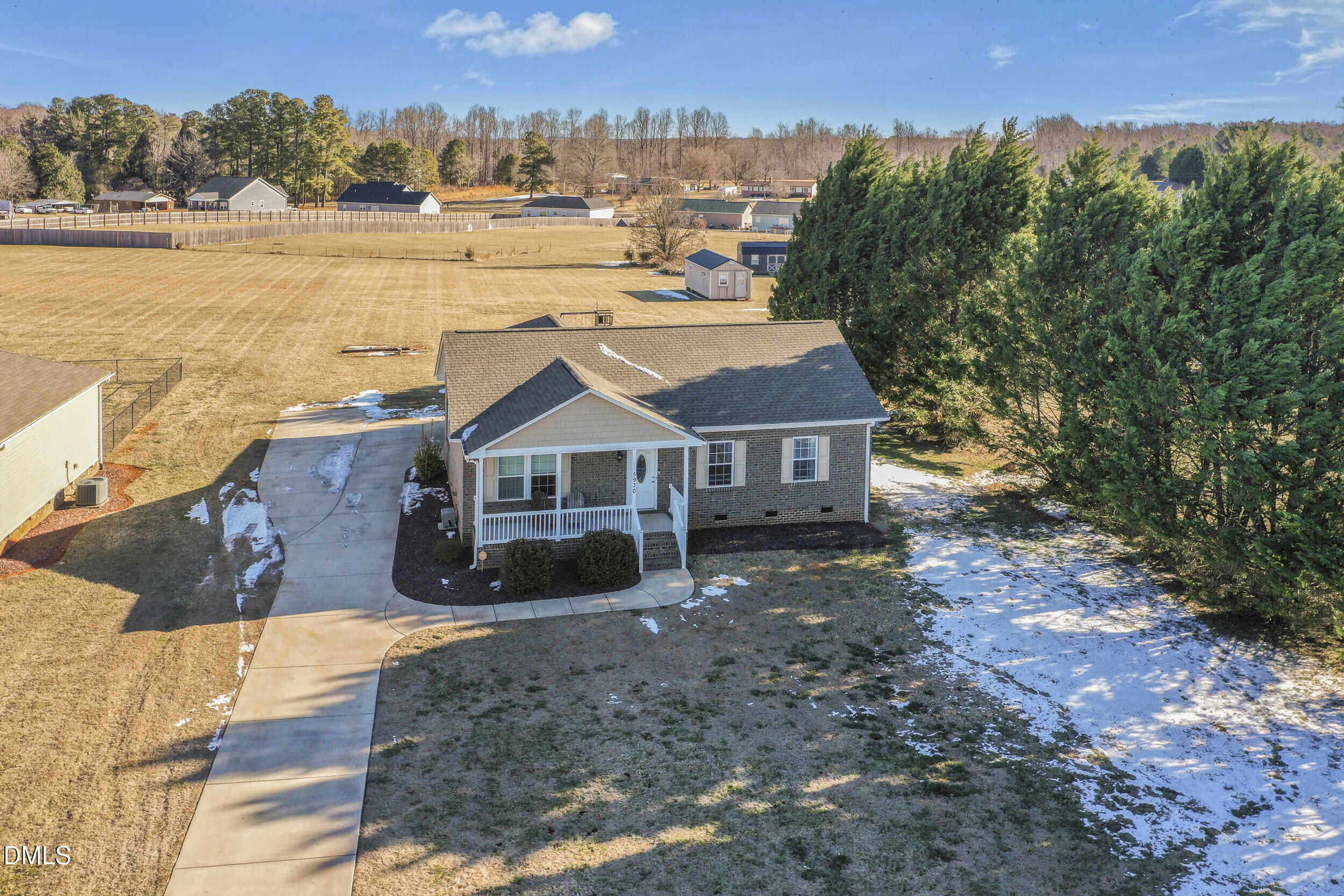 5930 Old 421 Road Liberty, NC 27298 - Photo 35 of 42 a front view of a house with a yard