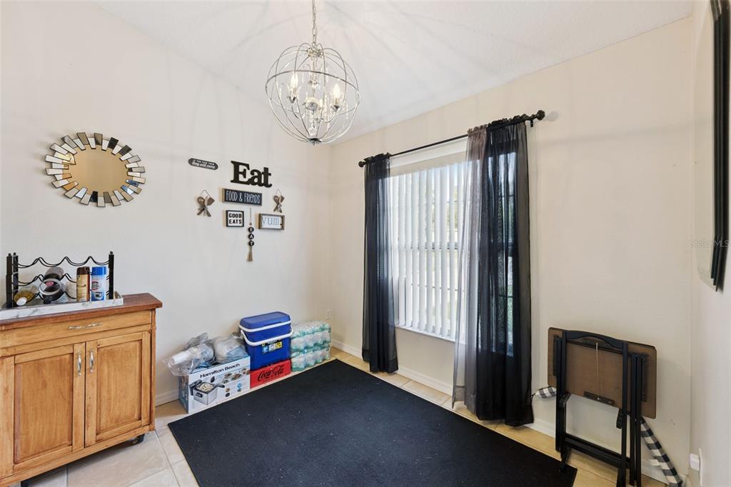 1308 Bates Avenue Eustis, FL 32726 - Photo 8 of 16 a view of a room with baby toys