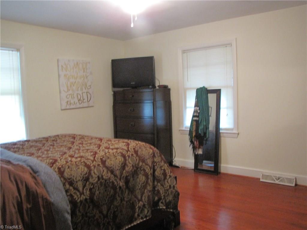 209 Rolling Road Burlington, NC 27217 - Photo 11 of 22 Master Bedroom w/refinished hardwoods